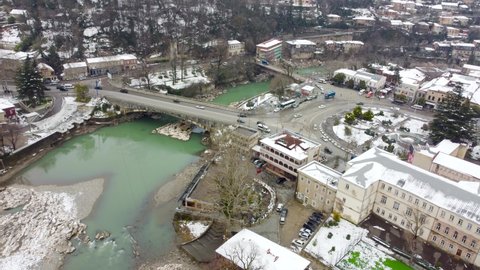 Kutaisi, Georgia - March 19, 2022: Aerial view on car traffic on bridges in Kutaisi.