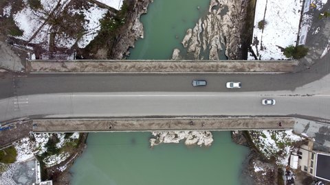 Kutaisi, Georgia - March 19, 2022: Top down view on traffic on Rustaveli Bridge.
