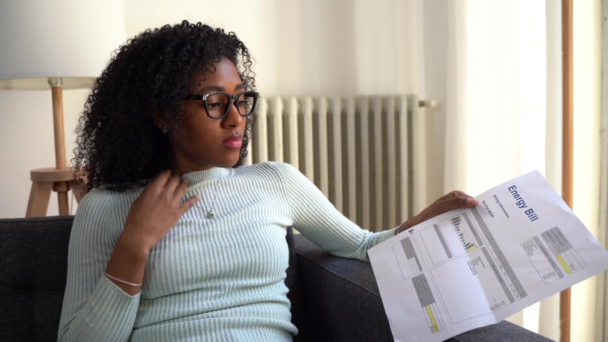 Video about black woman having problem paying energy bill expenses | Shutterstock HD Video #1088710783