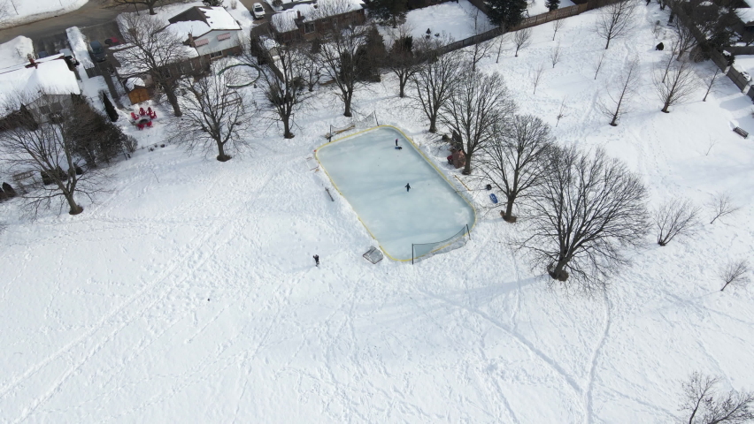 Kids playing ice hockey at Walker