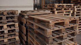 Wooden pallet front, angle view. Wood trays for cargo loading, transportation. Freight delivery, warehousing service equipment. Shipment in logistics and transportation industrial, wood pallets stack. - Powered by Shutterstock - Get 15% off with code: PIKWIZARD15