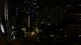 A night time lapse of a busy city street.
