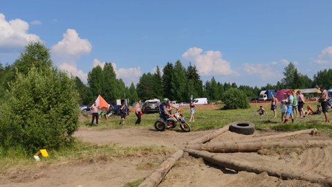 Russia - July 10, 2021. Torzhok, Panika village, Tver region. Motorcyclists on motorcycles are preparing for the start. Motocross. Enduro-cross. Motorcycle race with obstacles. Enduro competitions.
