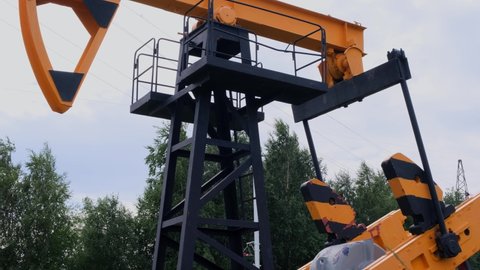 Oil rocking chair in Russia. The concept of oil production, refining and the cost of a barrel of oil