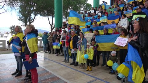 Fethiye, Turkey - 11th of Match 2022: 4K Ukrainians sing Ukrainian anthem on meeting against putins war
