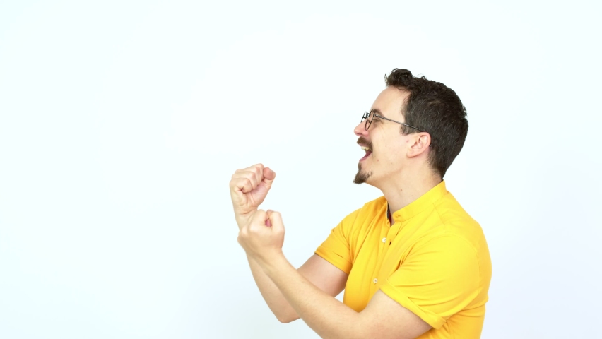 Man celebrating a victory over isolated background