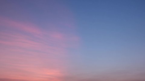 4K UHD : Sky Timelapse, Burning sky and shining, Red purple orange blue pink sunset. Romantic colorful sunset.Time lapse of skyscrapers.
