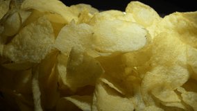 Potato chip mountain in studio gyrating with intimate light