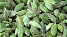 4K slow motion 100fps frame rate shutter speed clips of Cardamom herbs or Buah Pelaga rotating background. 