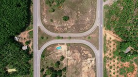 The highway from above road junction Aerial view top down of highway road.U-turn road Car traffic on a large highway