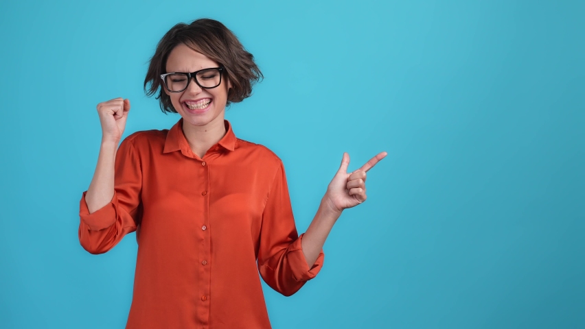 Lady advert empty space promotion thumb fist up isolated blue color background