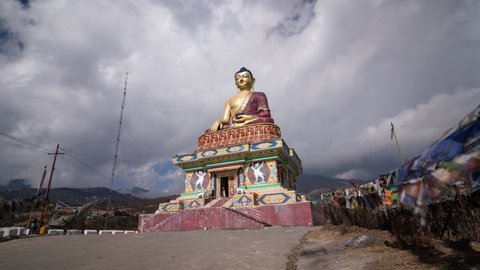 Tawang, Arunachal, India - January 24, 2020 : Clouds moving over buddha statue timelapse