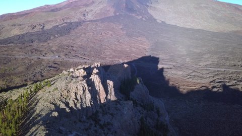 High mountain ranges on an aerial view in Tenerife Spain and the view of the clouds in the sky. volcano.geology.aerial shot