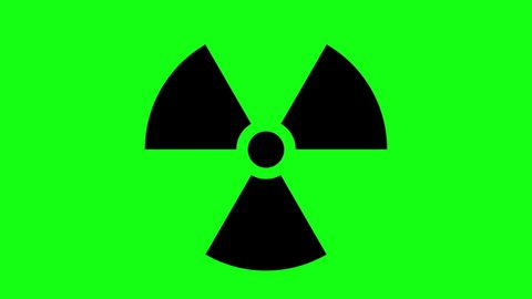 Radiation sign on a green background. The risk of nuclear war and radiation pollution