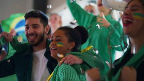Brazilian young football fans celebrating their team's victory at stadium. - Powered by Shutterstock - Get 15% off with code: PIKWIZARD15