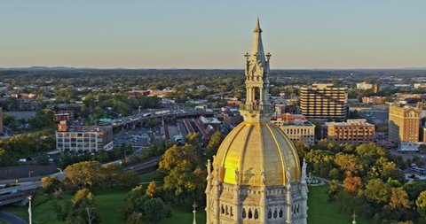 Hartford Connecticut Aerial v8 drone fly around eastlake architectural style state capitol building, capturing details of the exterior facade at sunset - Shot with Inspire 2, X7 camera - October 2021