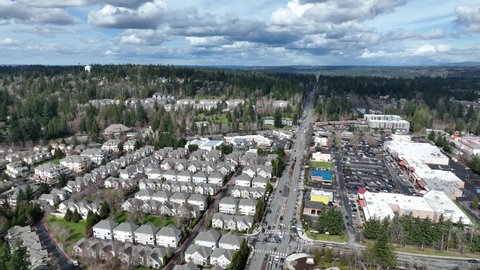 Cinematic 4K aerial drone pan shot of Sammamish Highlands, Saxony and Inglewood upscale, affluent Seattle neighborhoods near Issaquah in King County, Washington