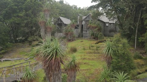 exterior of a reconstructed historic waldheim chalet and pandani plants at cradle mountain at cradle mountain national park in tasmania, australia