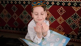 muslim boy praying, caucasian muslim boy praying, cheerful