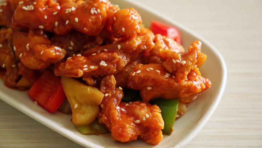 fried crispy chicken with sweet and sour sauce in Korean style