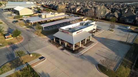Lantana , Texas , United States - 03 26 2022: Aerial footage of Pizza Hut and Sonic restaurants in Lantana Texas.