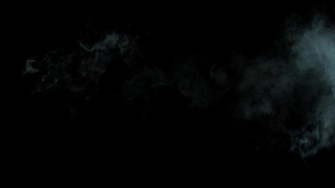 Realistic atmospheric gray smoke on black background. White fume slowly floating rises up. Abstract haze cloud. Animation mist effect. Smoke stream effect 4K.