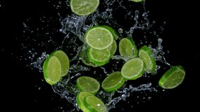 Super slow motion shot of rotating exploded lime slices with splashing water on black at 1000fps. - Powered by Shutterstock - Get 15% off with code: PIKWIZARD15