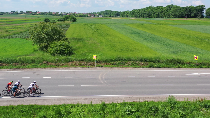 cyclists compete on the highway
