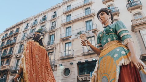 Barcelona, Spain; September 24th, 2021: Gegants dancing in the streets of Barcelona during La Merce Festival. Huge human figures representing Catalan identity and tradition.