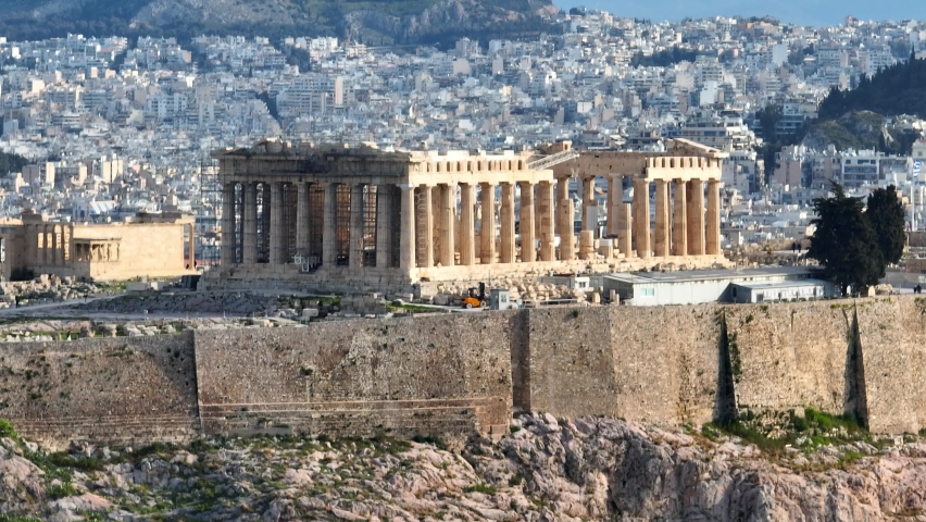 aerial tele shot of Acropolis in Greece, Parthenon in Athens, flying around famous Greek tourist attraction, Ancient Greece landmark. High quality 4k footage Royalty-Free Stock Footage #1088789569