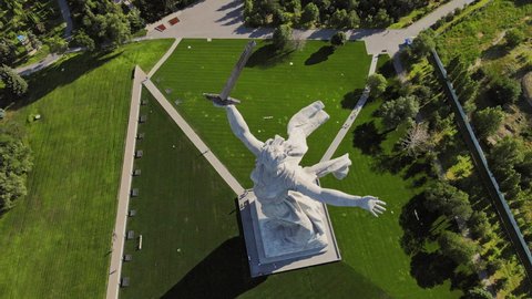 Drone view of the famous Soviet sculpture The Motherland Calls. The compositional center of the monument-ensemble to the Heroes of the Battle of Stalingrad - JULY 08, 2021 Volgograd, Russia
