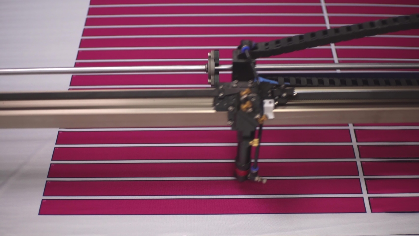 Laser machine cuts patterns from fabric | Shutterstock HD Video #1088799525