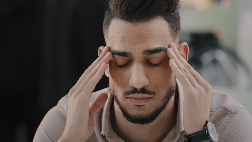 Portrait arab unhappy man unhealthy guy massaging temples unbearable headache depressed hispanic male suffering from migraine making complicated decision difficult divorce job loss business bankruptcy Royalty-Free Stock Footage #1088804519
