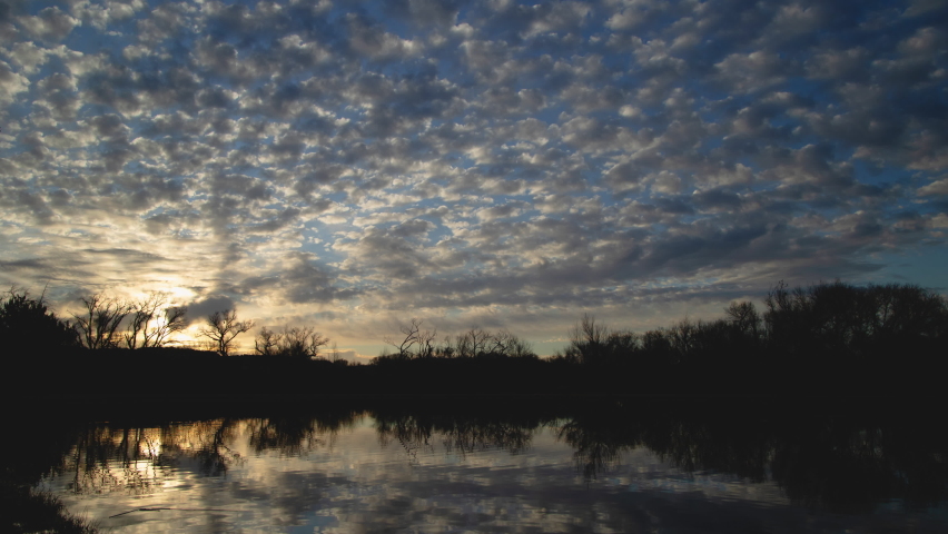 Brilliant Sunrise Clouds over Lake Timelapse