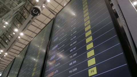 March 23,2022 : Bangkok, Thailand : POV of flight information board with cancellation flight inside the airport departure terminal  Suvannabhumi Airport while covid outbreak