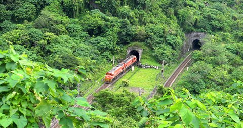 Chongde Railway Tunnel and Train at Qingshui Cliff, Suhua Highway, Taiwan