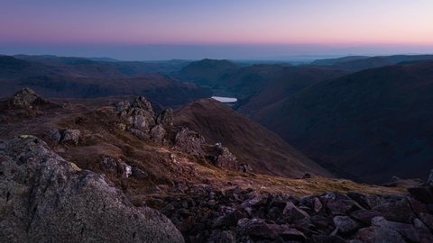 Sunrise on Red Screes in Lake District, Cumbria, UK.Beautiful morning in the mountains.Time-lapse video landscape scene.