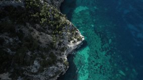 Aerial drone video of tropical paradise sea cliffs in the mediterranean, Sardinia, Costa Azzurra