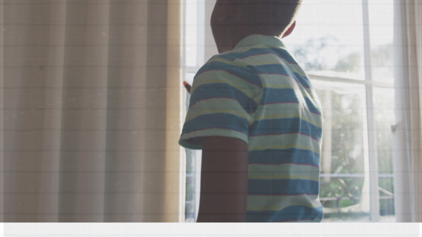 Welcome back to school text and school icons against african american boy opening curtains at home. school and education concept