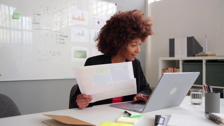 Creative businesswoman working in office using laptop Royalty-Free Stock Footage #1088825075
