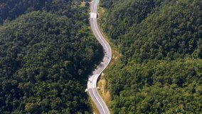 curvy road in valley aerial view from drone 4k video