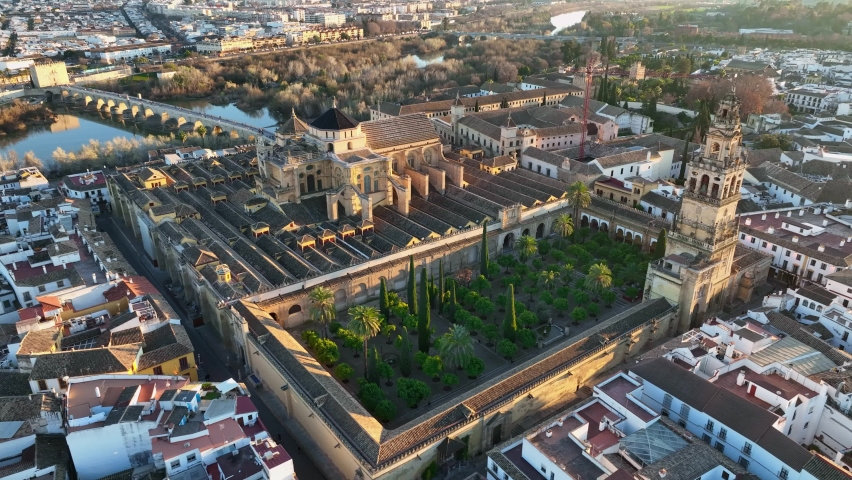 Aerial view of Gardens of the Alcazar of Cordoba, Spain. Flying over Mosque-Cathedral in Cordoba, Spain Royalty-Free Stock Footage #1088830121