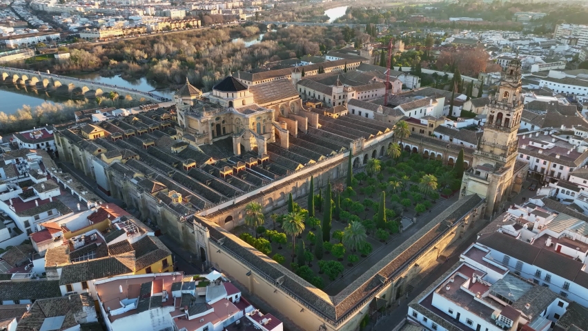 Aerial view of Gardens of the Alcazar of Cordoba, Spain. Flying over Mosque-Cathedral in Cordoba, Spain | Shutterstock HD Video #1088830121