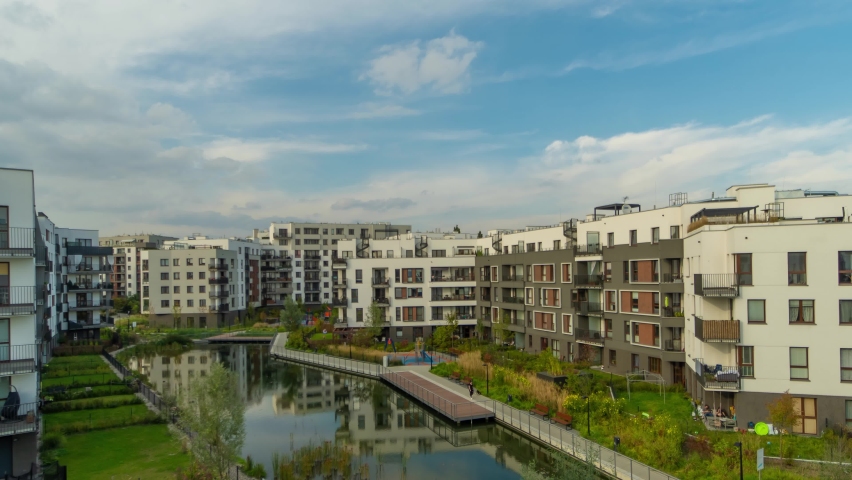 Change of weather and time of day in a modern residential quarter of a big city. Long time lapse for 24 hours.