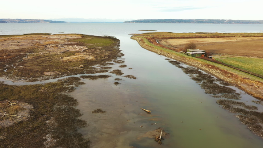 Aerial View of the Skagit Wildlife Area, Fir Island Farm Reserve.Over 200 acres of estuary in this protected zone, this birding habitat is intended to protect many animals passing through over winter