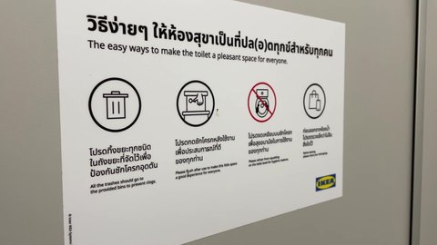 BANGKOK, THAILAND - Circa March, 2022: Toilet sticker sign at IKEA Store Bang Yai inside Central Plaza Westgate. Bathroom door poster symbol gives suggestion how to prevent clog, flush and hygiene
