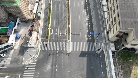 Drone aerial view of Empty Shanghai city during lockdown March 28 2022. Coronavirus, lockdown and news concept b-roll footage. No people and traffic in the road during the first day of Pudong lockdown