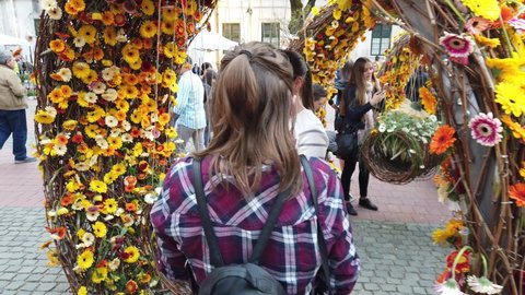 TIMISOARA, ROMANIA - April 21, 2019: TIMFLORALIS international flower festival. People and tourists are enjoying the flower decorations in the city center