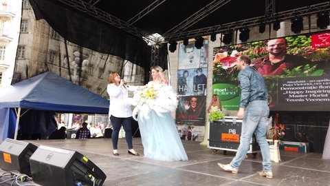 TIMISOARA, ROMANIA - April 21, 2019: TIMFLORALIS international flower festival. Dutch florist demonstrating flower arrangements on stage