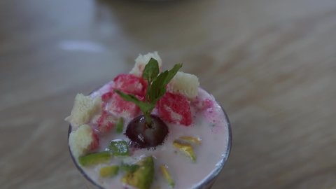 Es buah or sop buah-is an Indonesian iced fruit cocktail dessert. This cold and sweet beverage is made of diced fruits mixed with shaved ice or ice cubes, and sweetened with liquid sugar or syrup.